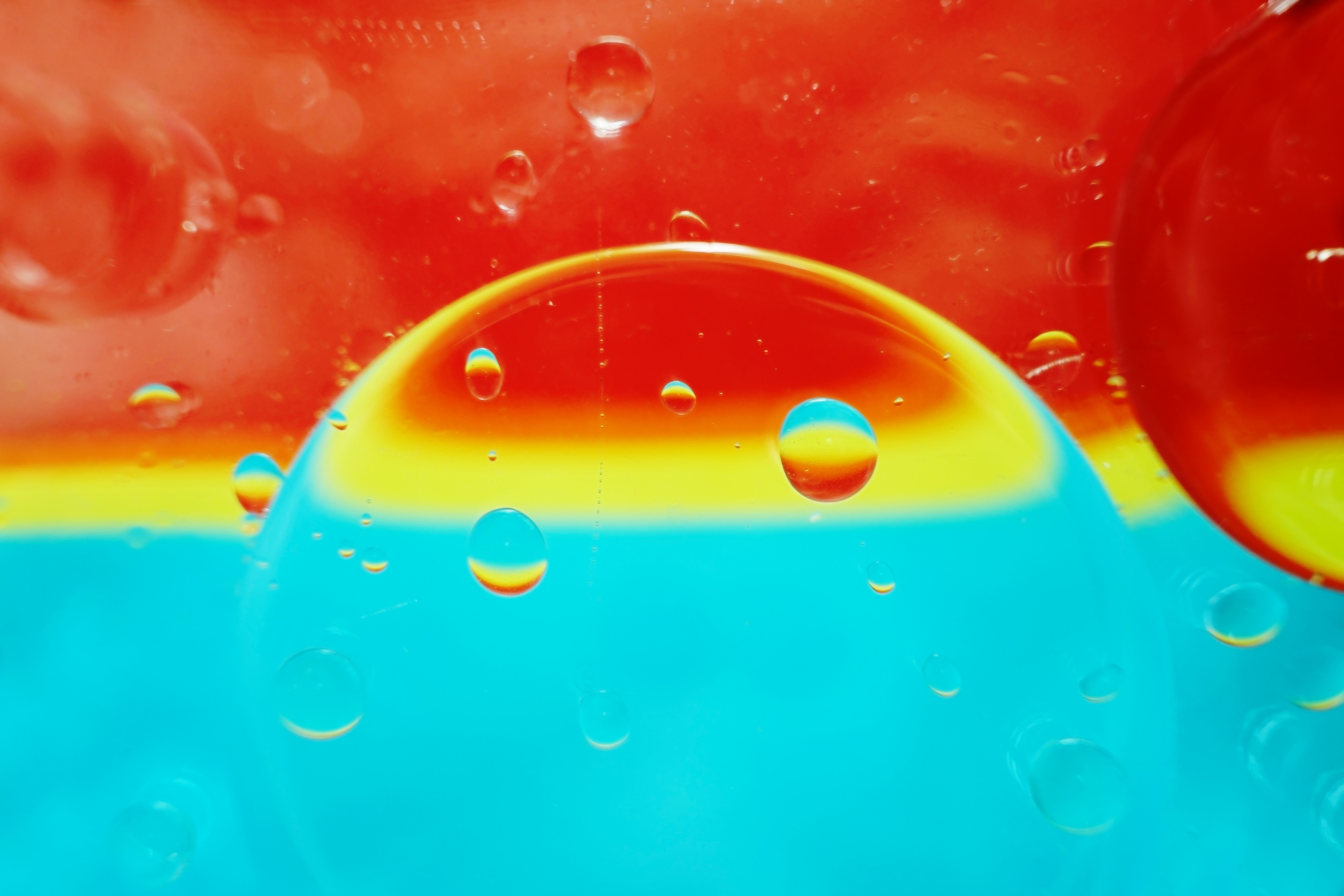 Vibrant macro of oil bubbles representing heat-sensitive compounds